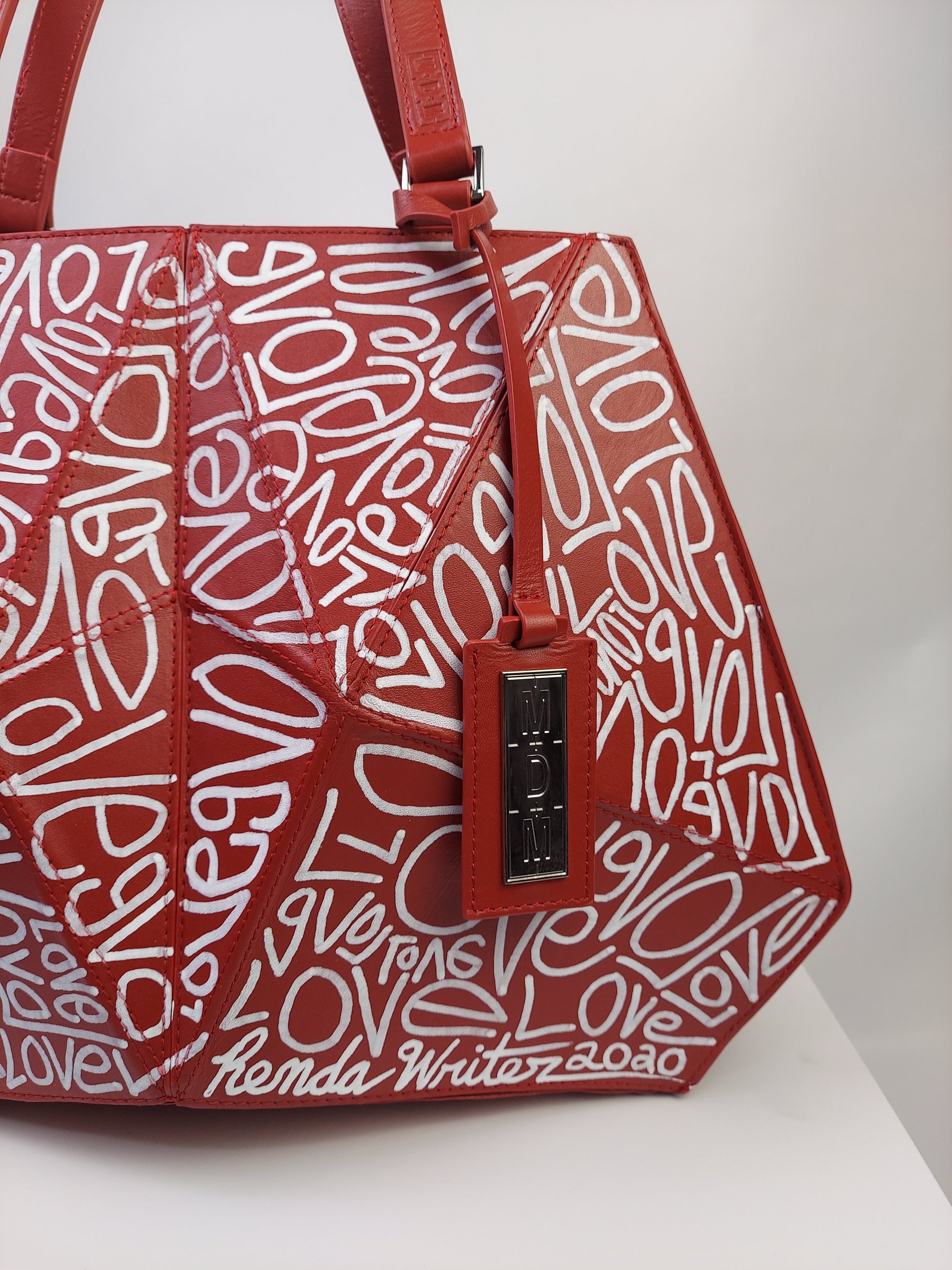 red art handbag collection